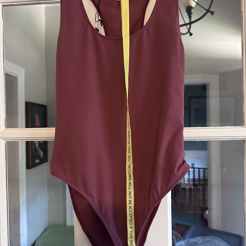STORM AIRLIFT CUTOUT BODYSUIT (DUSTY PINK)